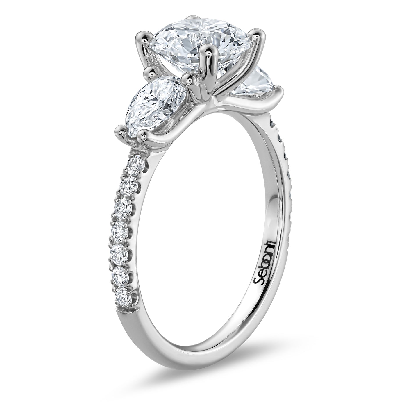 Three Stones Round and Pear Engagement Ring