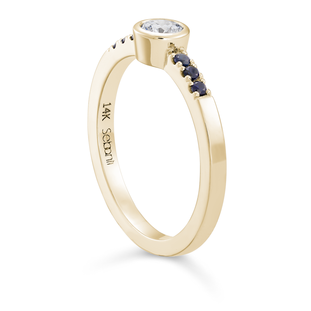 
                  
                    Diamond Bezel Ring with Blue Sapphire
                  
                
